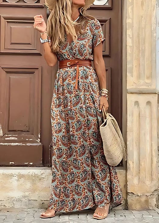 Pink boho maxi dress styled with sandals, showcasing relaxed fit and feminine silhouette