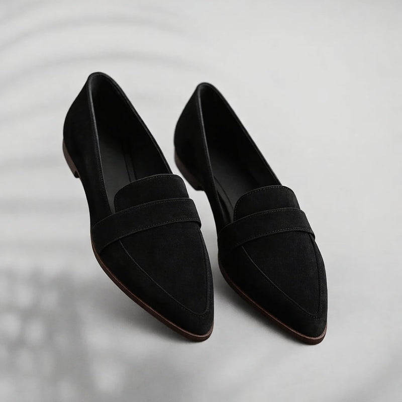 Kaitlyn sleek toe loafers in black with a clean elongated silhouette on a neutral background