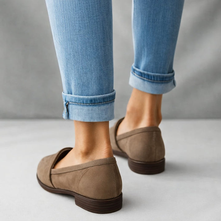 Side profile of Kaitlyn loafers in brown highlighting the streamlined flattering shape