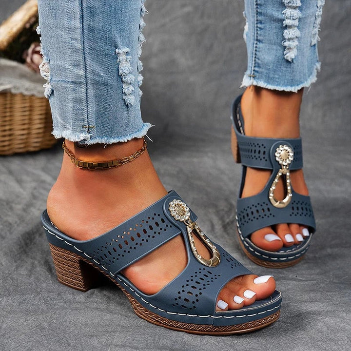 Women's slip-on wedge sandals in all four colors: black, blue, khaki, and pink