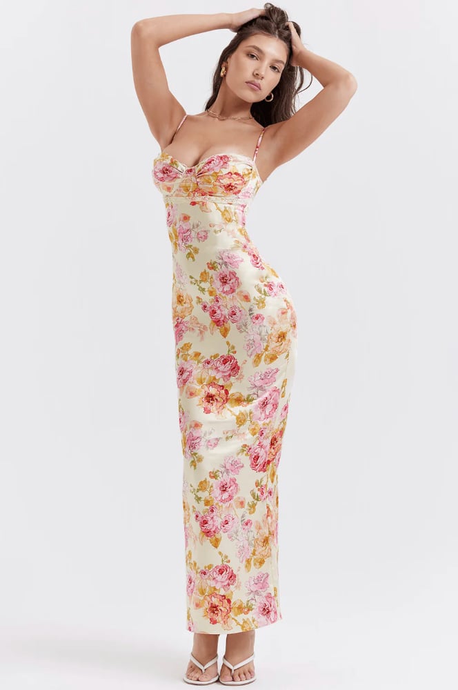Side view of the Katherine floral dress highlighting the skirt's soft, airy drape