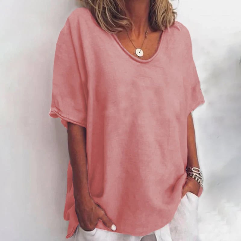 Model wearing the Kathleen loose blouse in a relaxed draped fit, showcasing its lightweight flowy silhouette