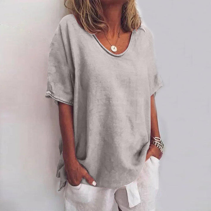 Close-up detail of the Kathleen loose blouse fabric texture showing its lightweight breathable quality