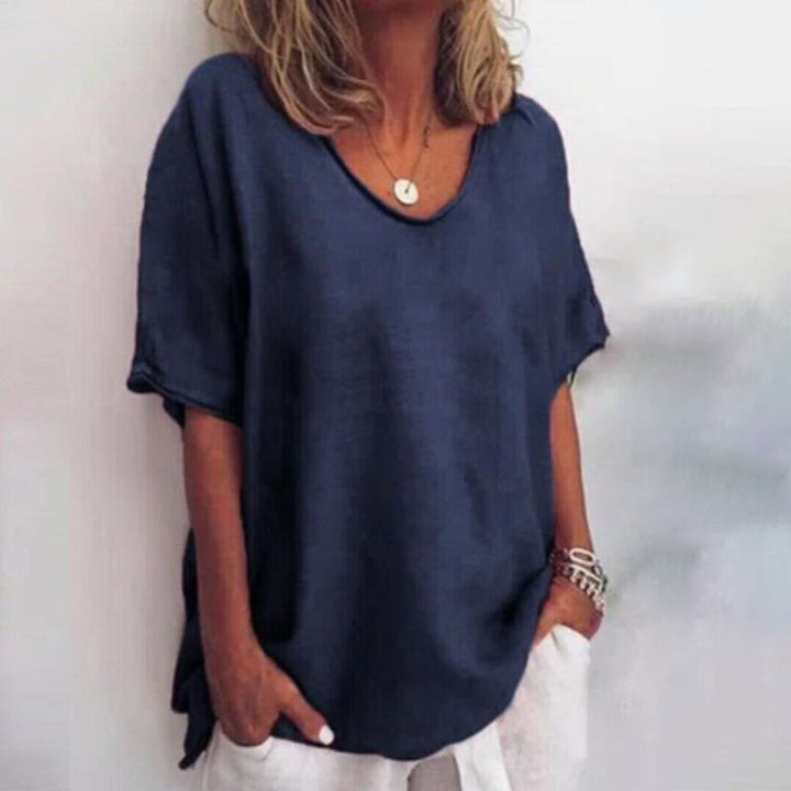 Model styled in the Kathleen loose blouse with jeans, demonstrating its versatile everyday look