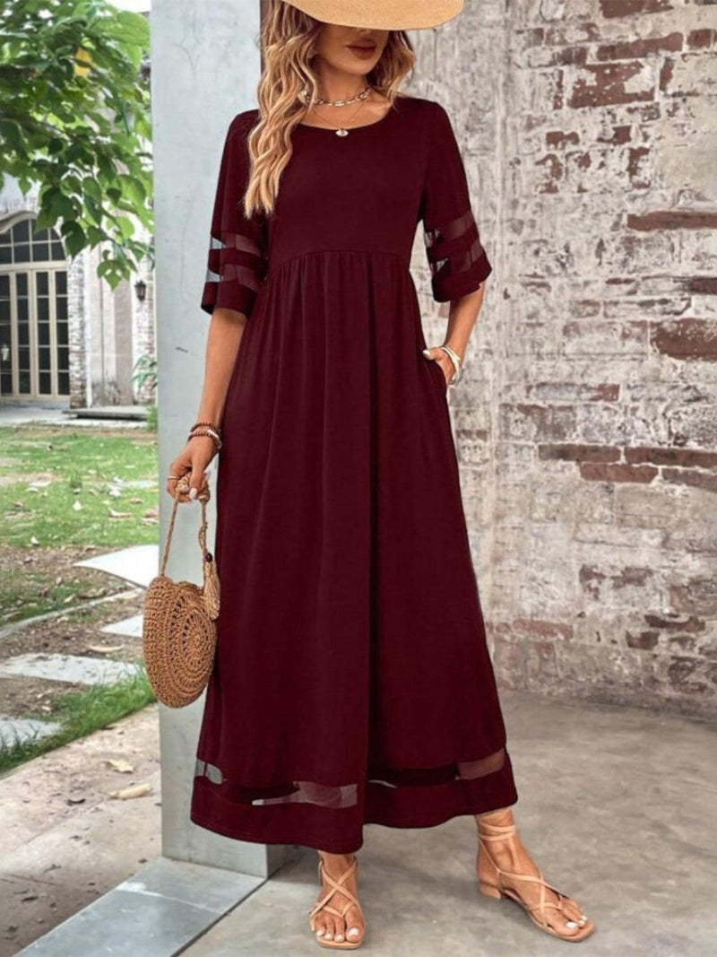 Side-angle view of the tummy-flattering coverage dress highlighting the smooth, curve-enhancing fit