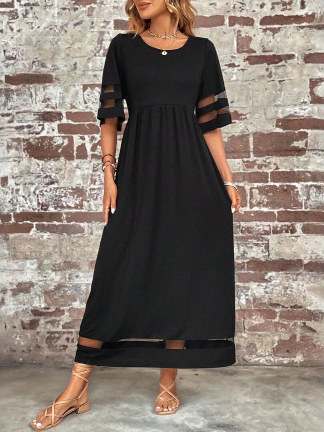 Back view of the chic coverage dress demonstrating the smooth, flattering cut from S to 3XL