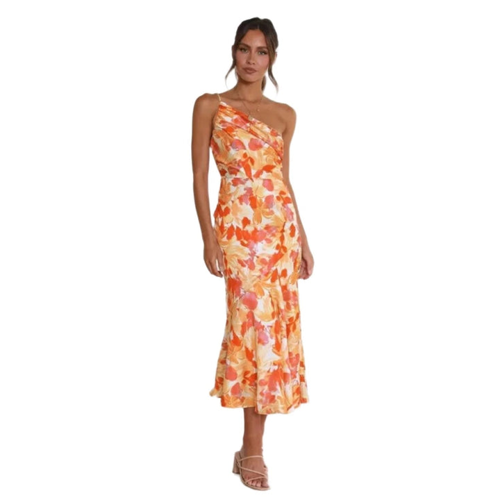 Yellow floral maxi dress on a model, highlighting the one-shoulder neckline detail