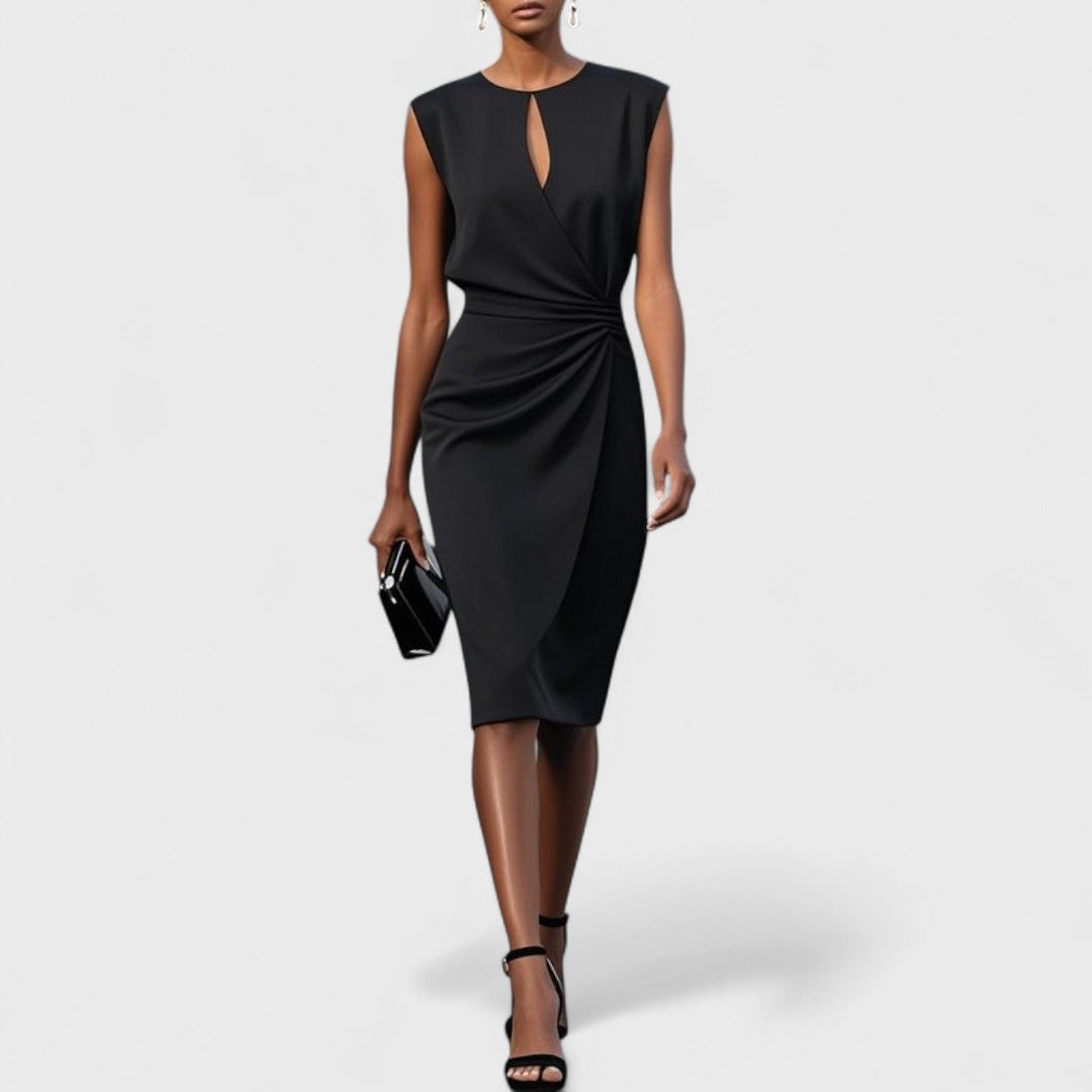 Model wearing the Kathy elegant classy dress from a side angle highlighting the silhouette