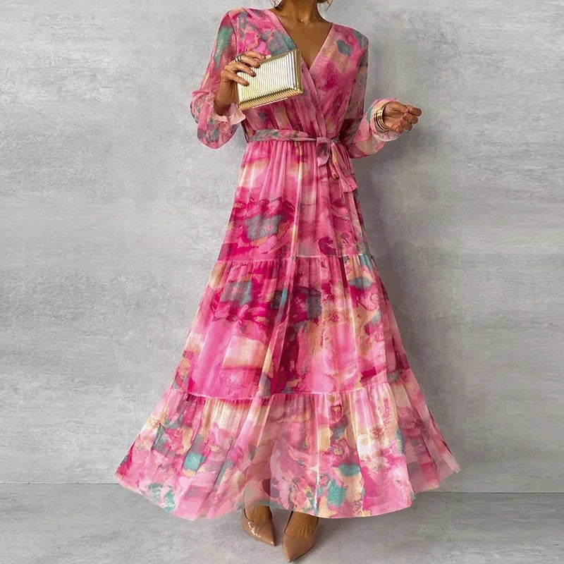 Side view of the elegant floral midi dress highlighting the flattering silhouette and ankle-length hemline