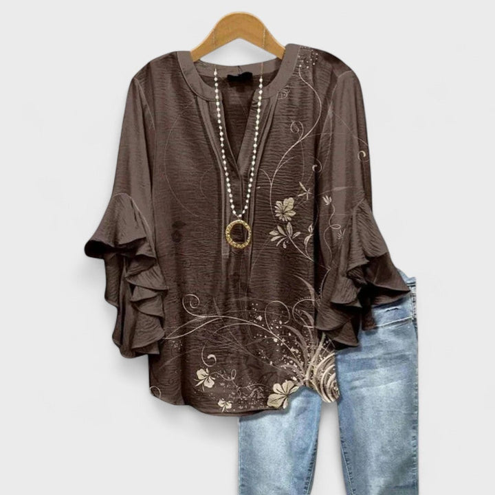 Close-up detail of the Kay lightweight day blouse in brown, highlighting soft fabric texture and design
