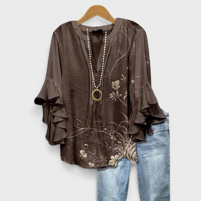 Close-up detail of the Kay lightweight day blouse in brown, highlighting soft fabric texture and design