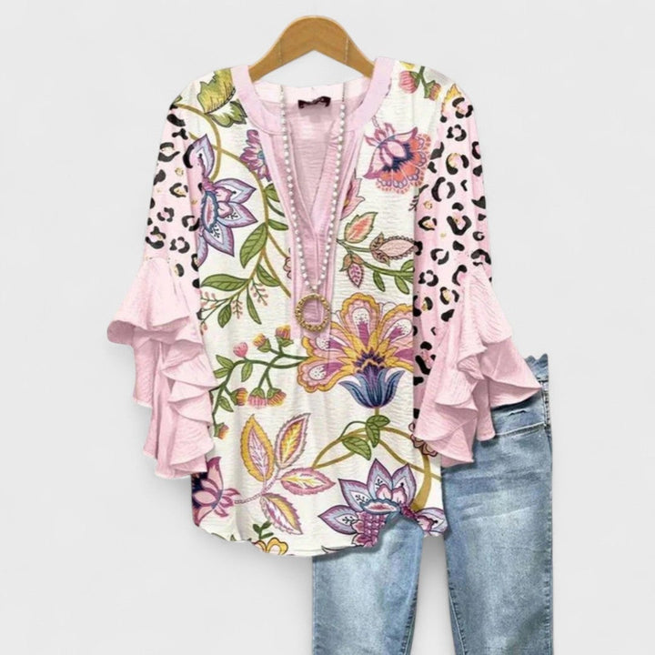 Side view of the Kay lightweight day blouse showing sleeve length and overall fit