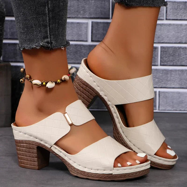 Beige Keira block heel sandals showing cushioned footbed and arch support