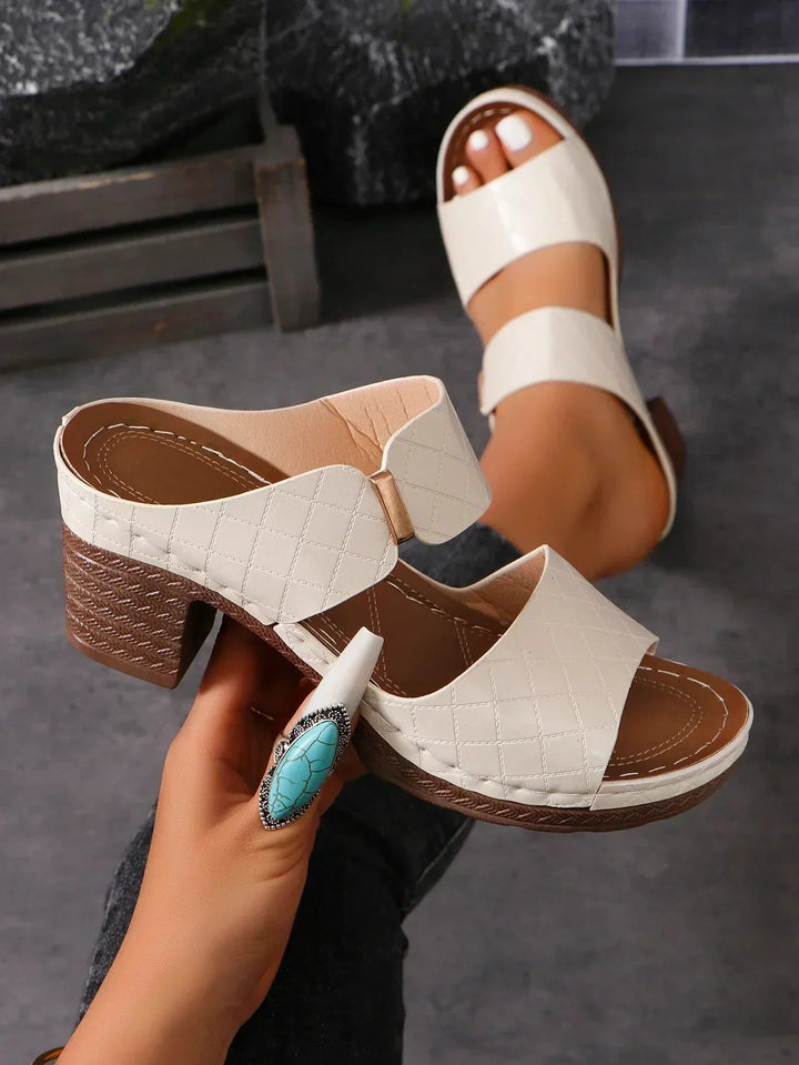 Overhead flat lay of all four Keira sandal color options: green, gray, black, and beige