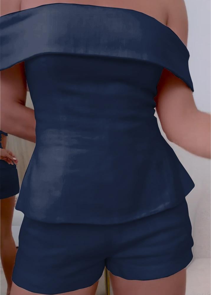Black elegant two-piece tailored suit, front view on model