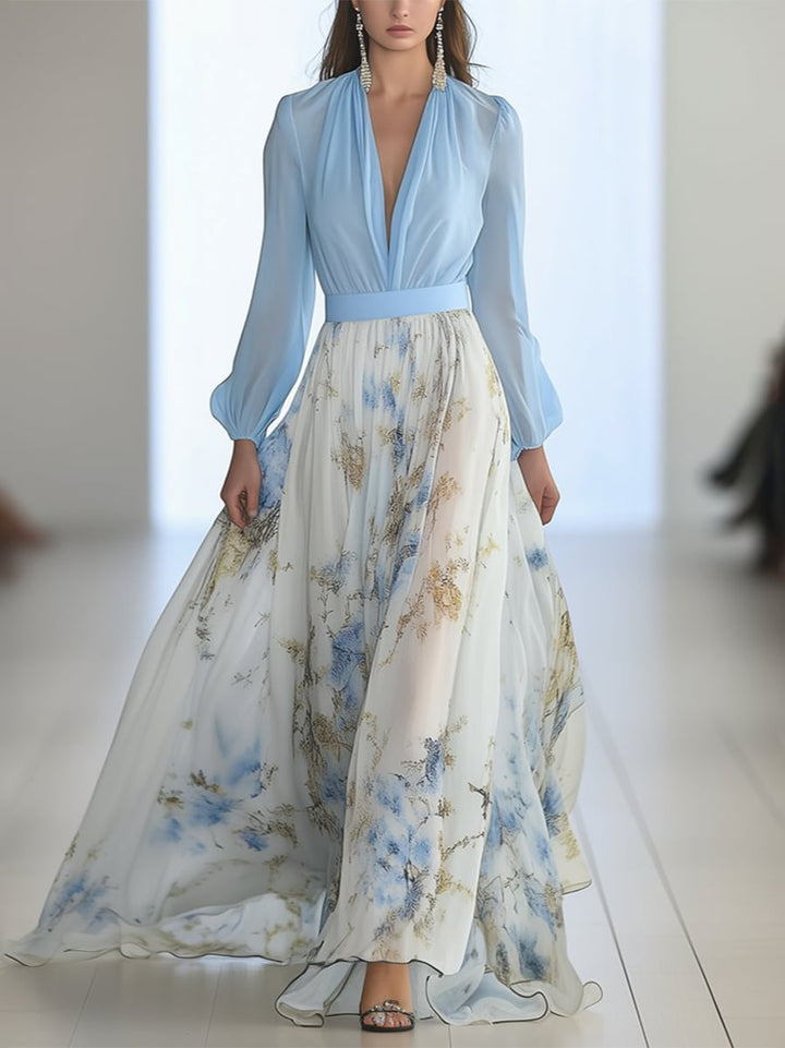 Woman wearing a vibrant floral print maxi dress with a V-neckline and loose flowing silhouette, front view