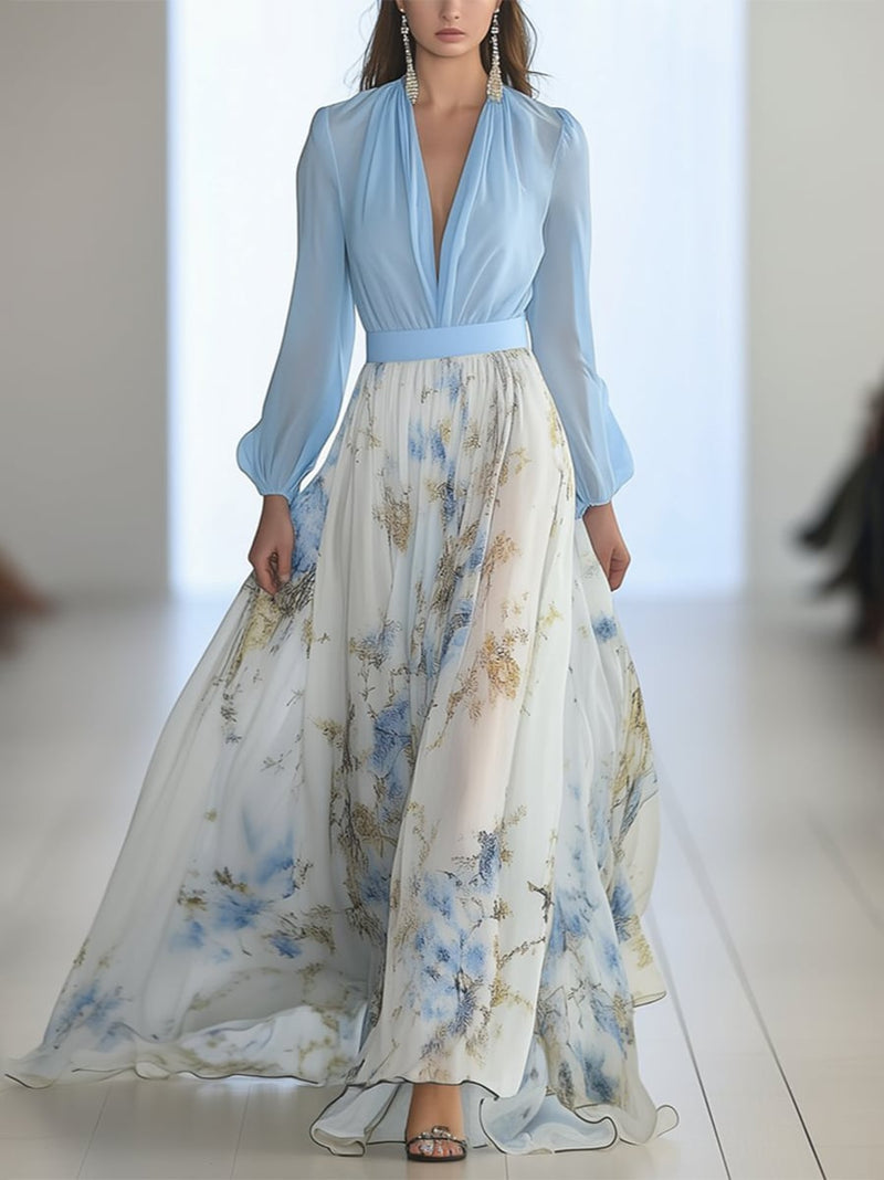 Woman wearing a vibrant floral print maxi dress with a V-neckline and loose flowing silhouette, front view