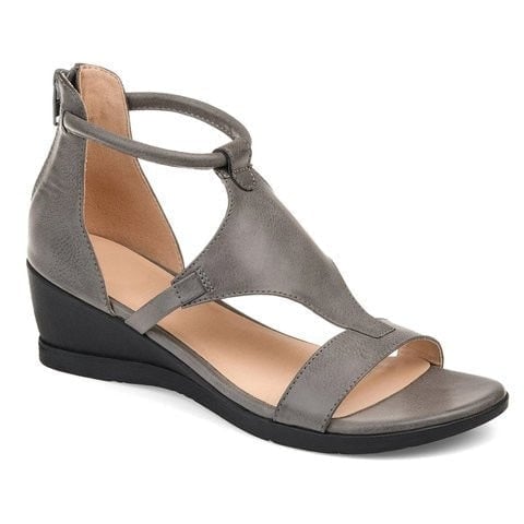 Woman wearing Kendall orthopedic sandals in brown paired with a casual summer dress