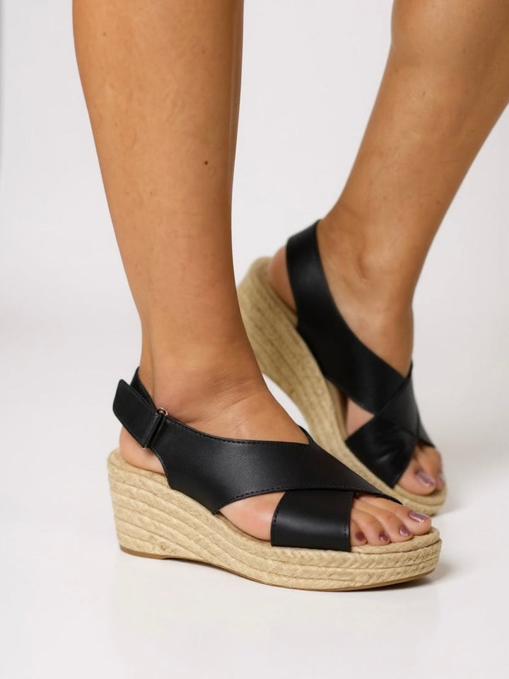 Kendall espadrille wedge sandal in white shown from the front on a clean background