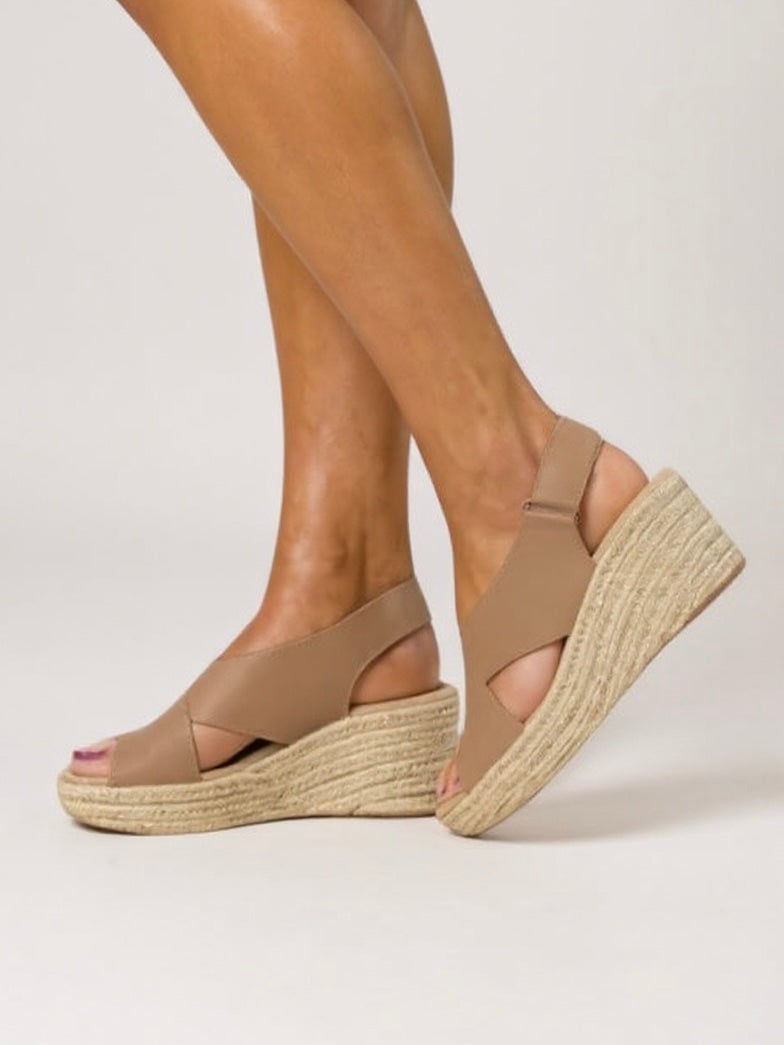 Kendall wedge sandal in black with adjustable ankle strap, side profile view