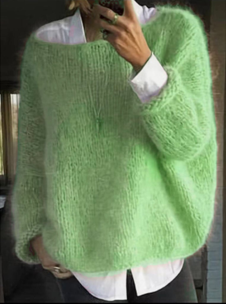 Close-up of knitted sweater fabric detail highlighting soft, skin-friendly texture