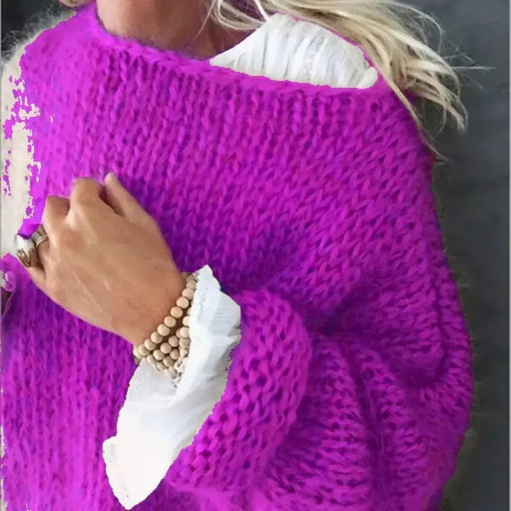 Side profile of woman in lightweight knitted sweater showing silhouette and easy layering potential