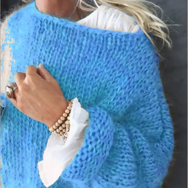 Flat lay of the Kerry knitted sweater showing color and knit construction