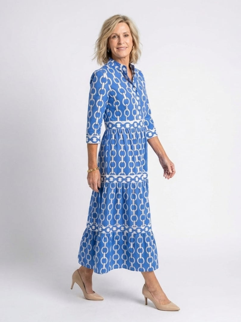Front view of the Keziah chain print midi dress in blue showing tiered skirt detail