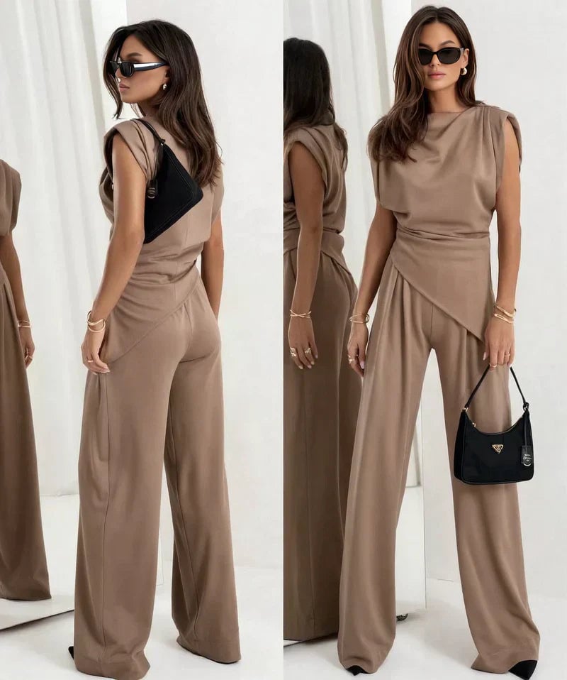 Side profile of model in the Khloe wide-leg pant set in khaki highlighting the elongated high-waist silhouette