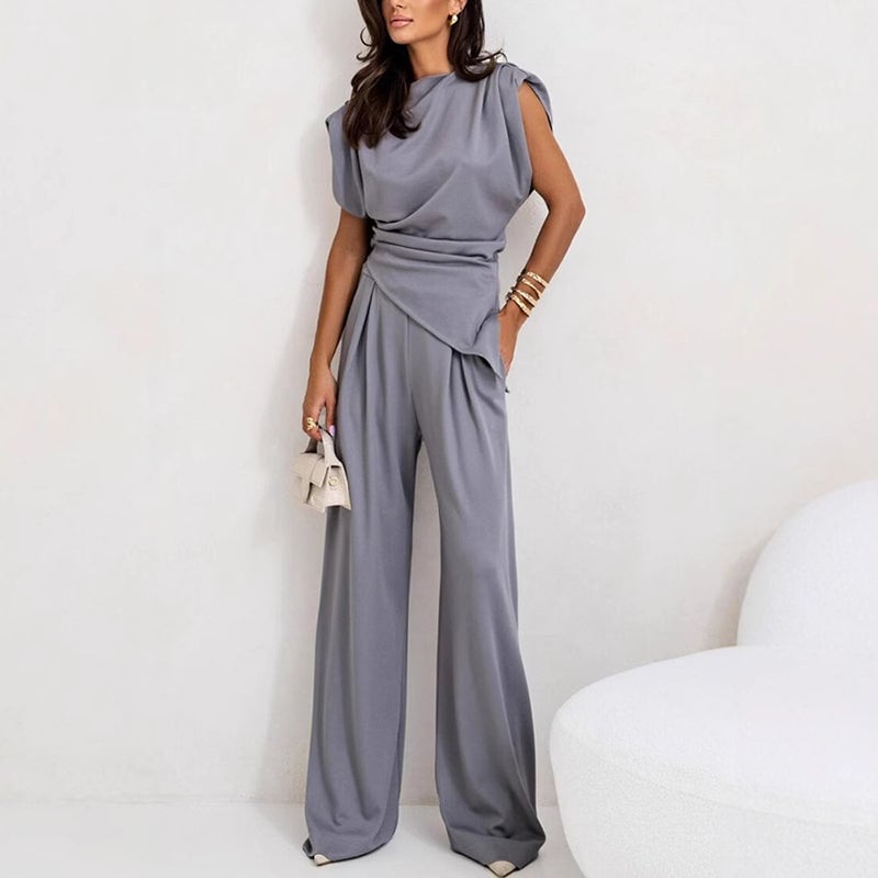 Full-length shot of the Khloe set in white showing the flowing wide-leg pant drape