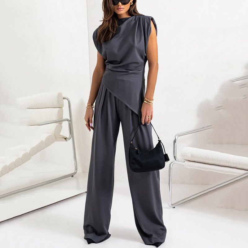 Flat lay of the Khloe two-piece set in khaki showing top and pants side by side