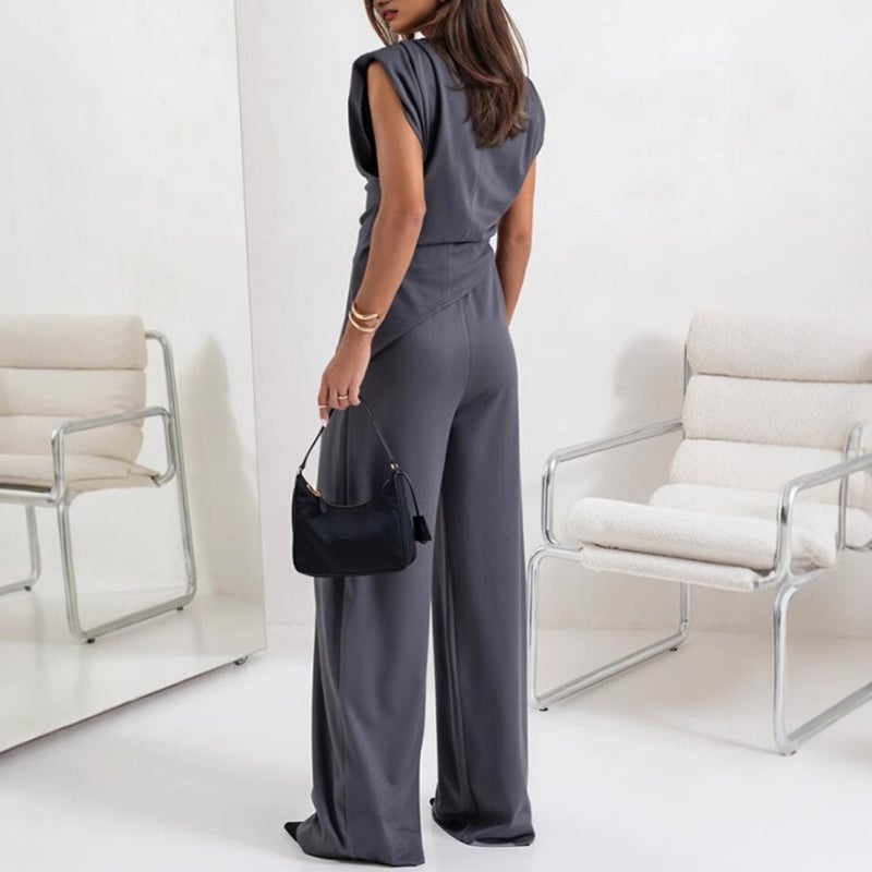 Close-up of the lightweight wrinkle-resistant fabric on the Khloe two-piece set in dark gray