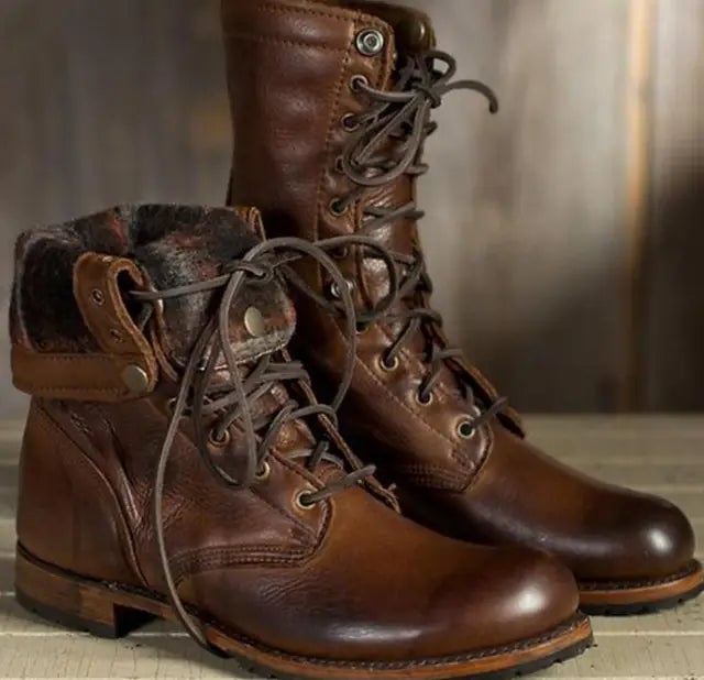Women's lace-up boots in black displayed on a clean background, full side profile view