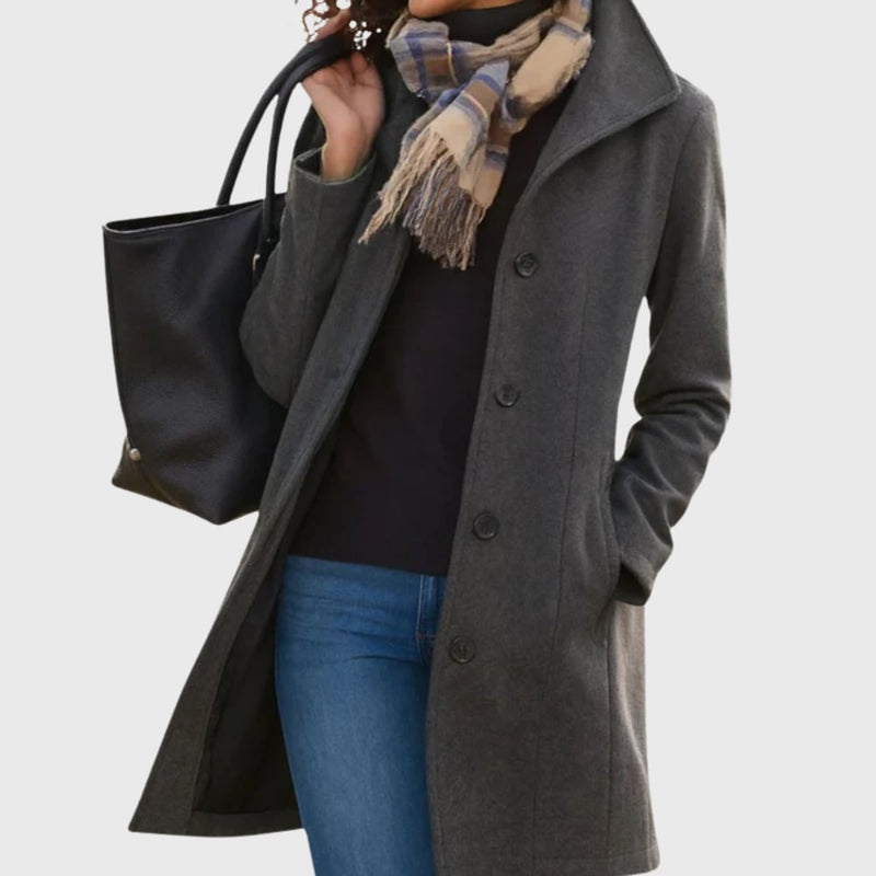 Side profile of the Kimmy longline coat in grey highlighting the streamlined figure-flattering cut