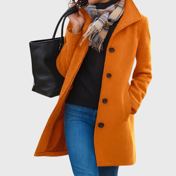 Lifestyle image of the Kimmy longline coat styled for a weekend outing in moss green