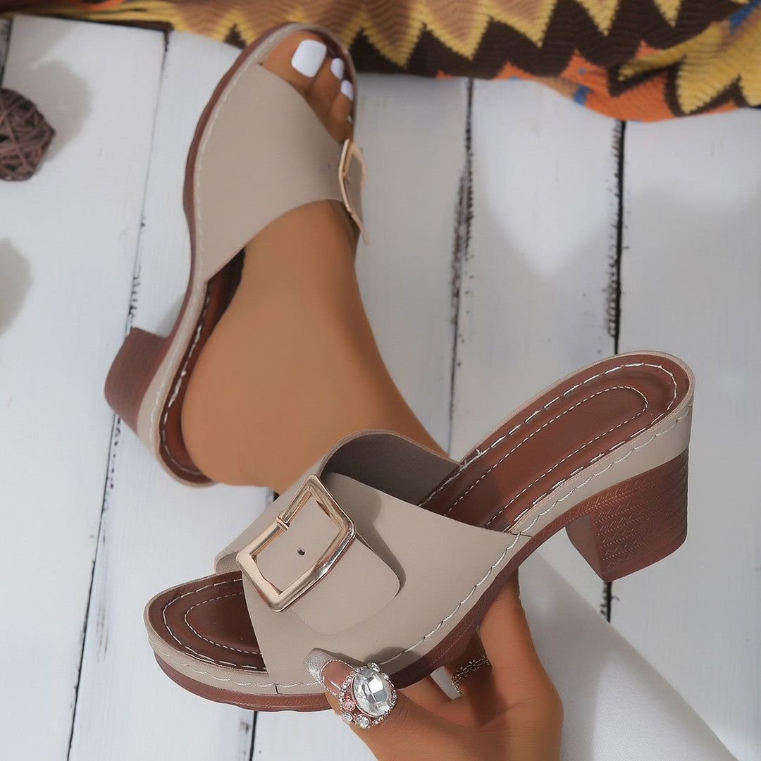 Kit women's sandal in black, top-down view on neutral background