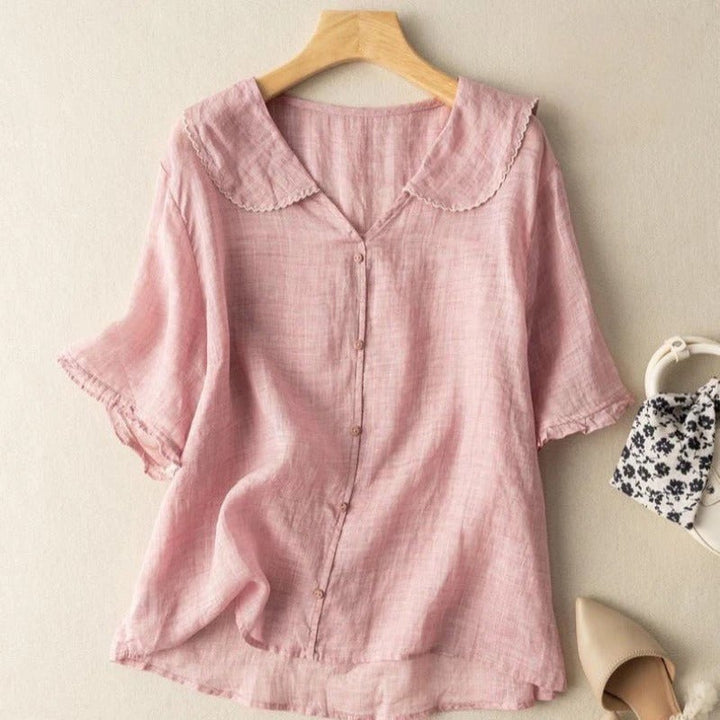 Florimay Kristi vintage blouse shown in a soft peach color with relaxed silhouette