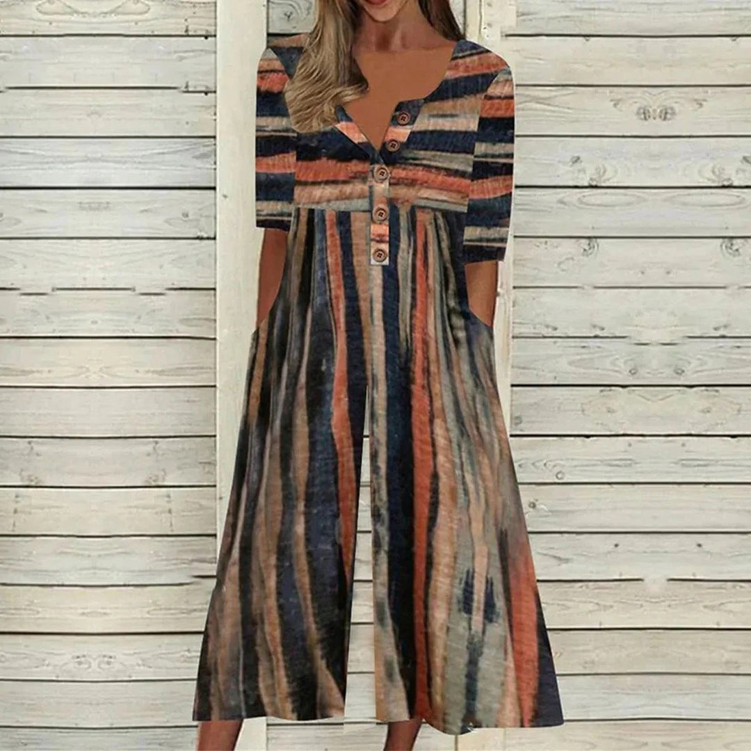 Side view of the Lagoon wide leg cropped jumpsuit highlighting the gathered waist and relaxed silhouette