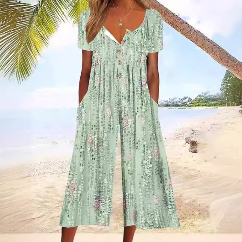 Full-length back view of the Lagoon leaf print wide leg jumpsuit in light blue