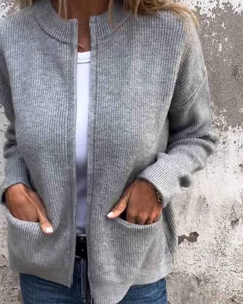 Woman wearing a soft relaxed-fit gray everyday cardigan, front view