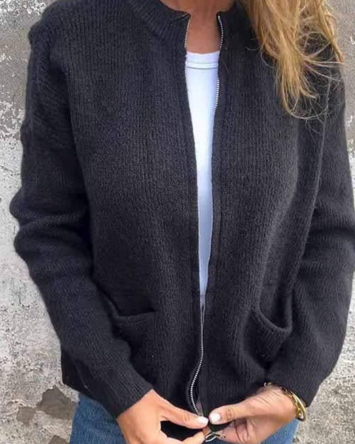 Flat lay of the Lana everyday cardigan in all three colors: gray, black, and brown