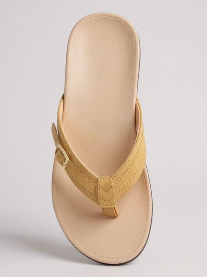 Lantana slip-on sandals in red displayed at an angle highlighting the flexible sole