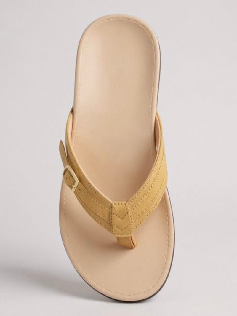 Lantana slip-on sandals in red displayed at an angle highlighting the flexible sole