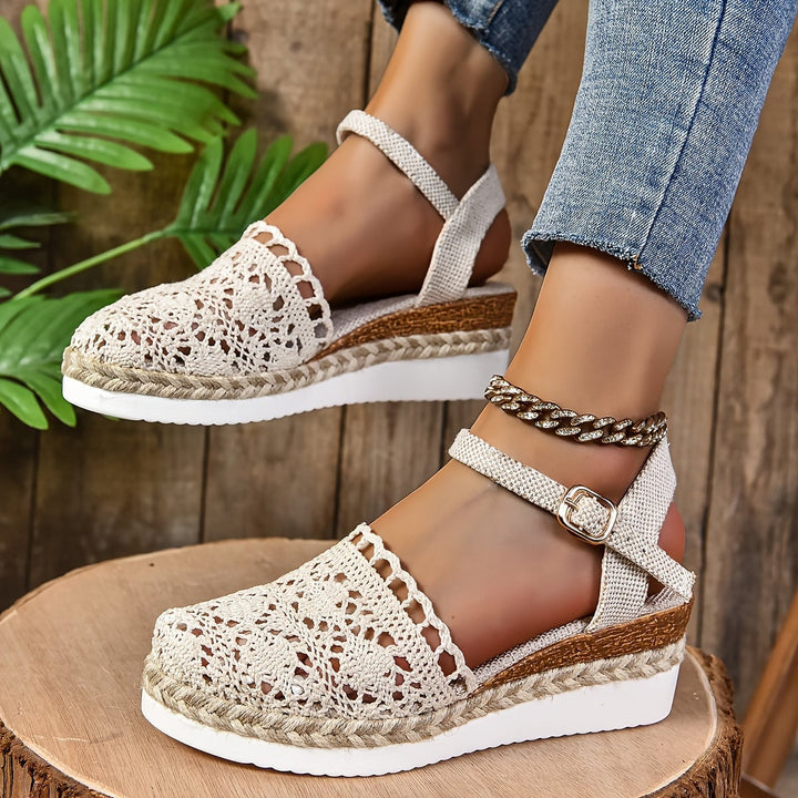Close-up of Lantana sandal adjustable strap buckle detail in dark brown