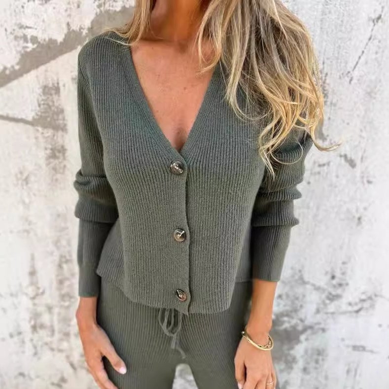 Side view of the Lara cardigan set in black highlighting the flattering silhouette and sleeve length