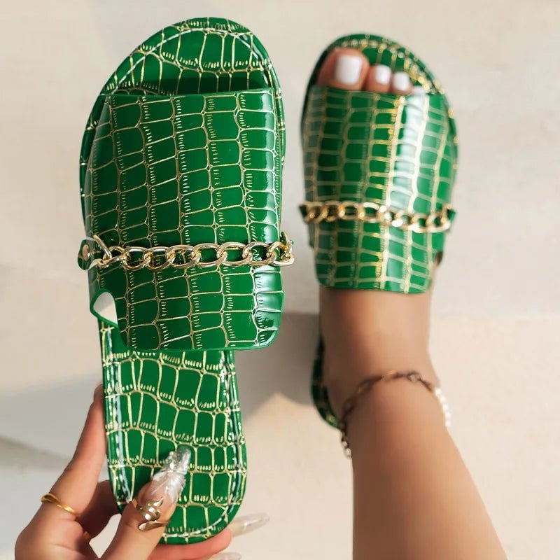 Lark sandals in red croc-embossed finish on a clean white background