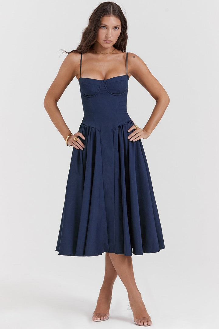 Full-length side view of the Lark maxi dress highlighting its smooth, flowing silhouette