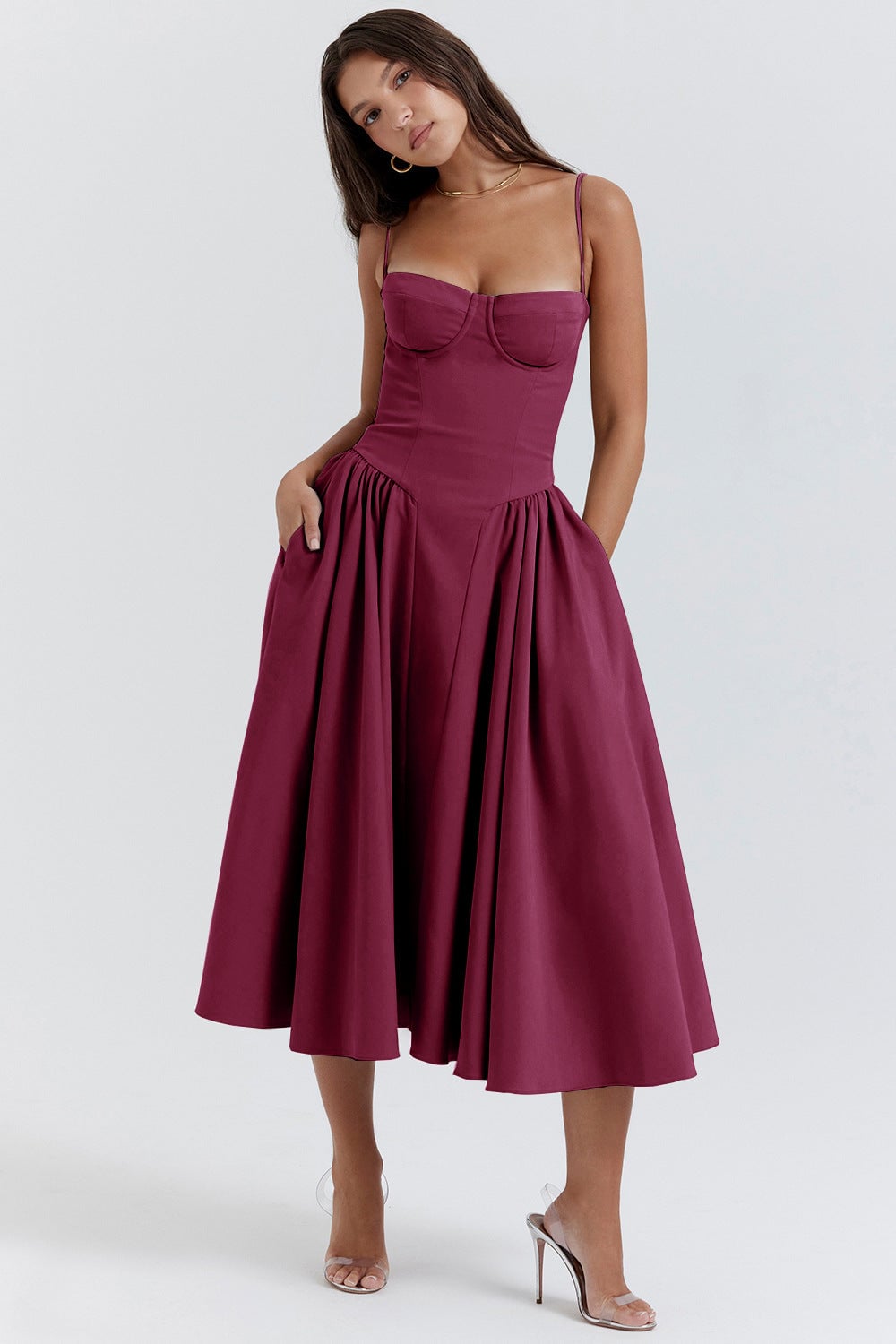 Woman wearing the Lark maxi dress outdoors in a relaxed, elegant warm-weather setting