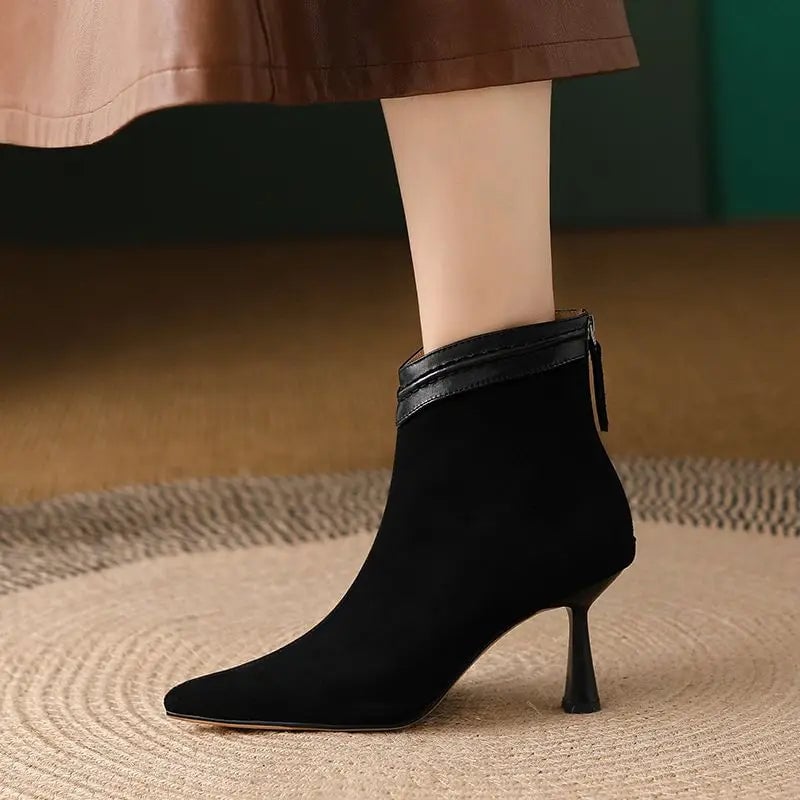 Close-up of the Laura ankle boot toe box and sleek upper in black