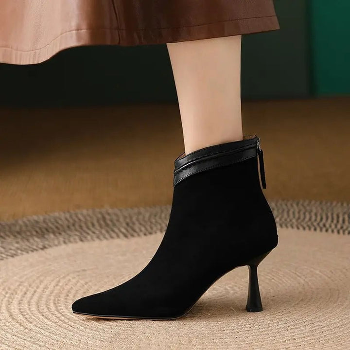Close-up of the Laura ankle boot toe box and sleek upper in black